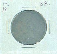 Obverse in holder showing date 1881 and grade F12