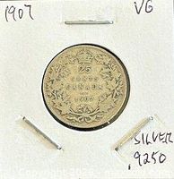 Coin in 2x2 holder showing reverse wreath side