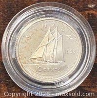 Reverse side showing Bluenose schooner and 10 CENTS legend