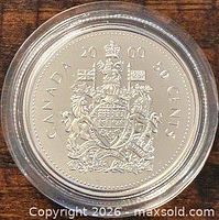 Reverse side with Canadian Coat of Arms, year 2000 and denomination 50 cents