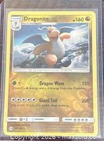 Front of Dragonite reverse holo card in sleeve