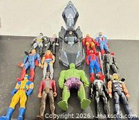 Group shot of all figures and vehicle laid out