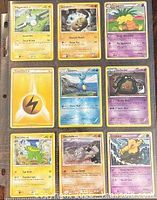 Fronts of nine Pokémon cards in 3×3 sleeve sheet