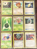 Front view of all nine Pokémon cards in a 9-pocket sheet