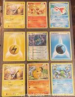Front view of all nine cards in a binder page