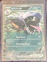 Front of Arbok ex card showing artwork, HP 270, attacks