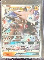 Front of Lycanroc GX SM14 promo card showing artwork, stats, attacks, holo finish