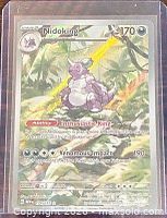 Front of Nidoking AR card showing artwork, number and condition