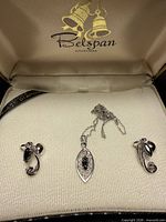 Necklace and earrings in original Belspan case
