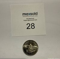 Obverse view of 1977 Nootka Dollar coin