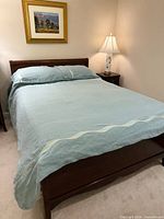 Duvet set displayed on bed showing colour and trim detail