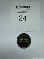 Full view of coin below lot card