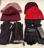 Group shot of 4 toques and 3 pairs of gloves