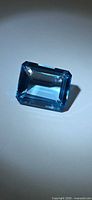 Front view of emerald cut Swiss blue topaz