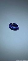 Front view of oval deep blue Tanzanite gemstone