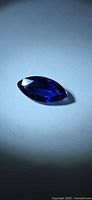 Marquise cut deep purple iolite gemstone front view