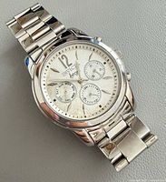 Front view of Invicta Angel stainless steel wristwatch showing dial and bracelet