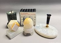 group of marble and onyx items including salt & pepper shakers, candle holder, pen base, egg and paperweight