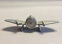 front view showing full airplane clock