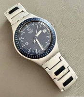 Full view of Swatch Irony watch showing bracelet and dial