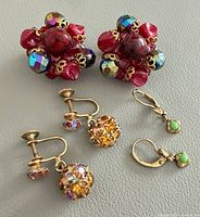 All three earring pairs arranged together