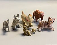 Six figurines grouped for size and variety reference