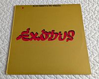Front cover showing gold sleeve and red Exodus title