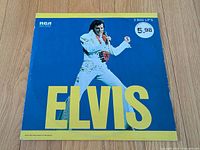 Front cover showing artist image and title