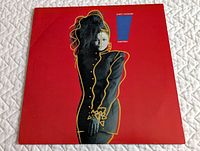 Front cover showing artwork and artist/album text