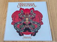 Front cover with rose and snake artwork