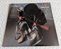 front album jacket showing artwork and title