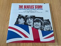 Front cover showing album title, Beatles portraits and Union Jack graphic