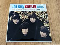 Front jacket showing album title and Beatles photo