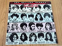Front cover of Rolling Stones "Some Girls" LP showing die-cut multicolour design