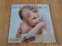 Front sleeve with cherub artwork and Van Halen title