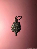 Front view showing raised design and DOMINO CLUB text