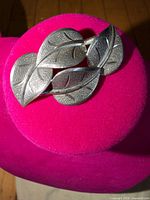 Front view showing overlapping leaf design