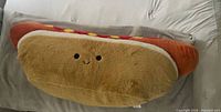 Front view of Mimicoco plush hot dog pillow