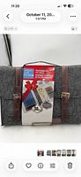 Front view of gray messenger bag with retail header card showing contents