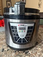 Front view showing Power Pressure Cooker XL digital control panel