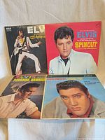 All four LP covers laid out