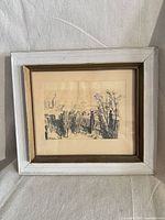 Front view of framed charcoal drawing