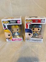 Front view of both boxed figures side by side