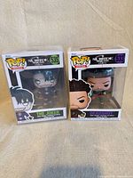 Front view of both boxed figures