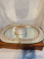 Full view of tray with trinket box on wood stand