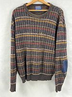Front view of Pendleton wool sweater on hanger