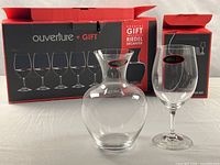 Outer box showing Ouverture + Gift branding, one decanter and one glass displayed
