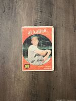 Front of 1959 Topps Al Kaline card showing red border and batting image
