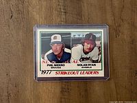Front of 1978 O-Pee-Chee #6 Strikeout Leaders card showing Phil Niekro and Nolan Ryan images and title