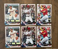 Front view of six 2018 Bowman rookie baseball cards laid out in two rows